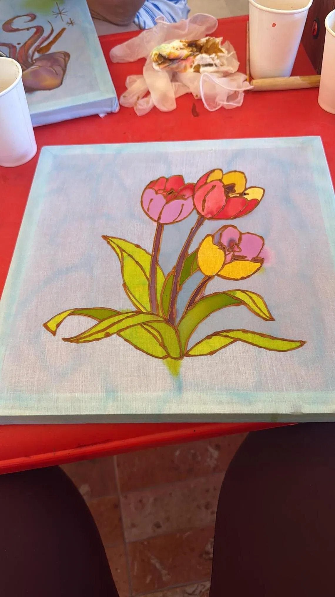 Guests can try batik painting for 250,000 rupiah. The 90-minute activity involves outlining designs with hot wax before adding colour.