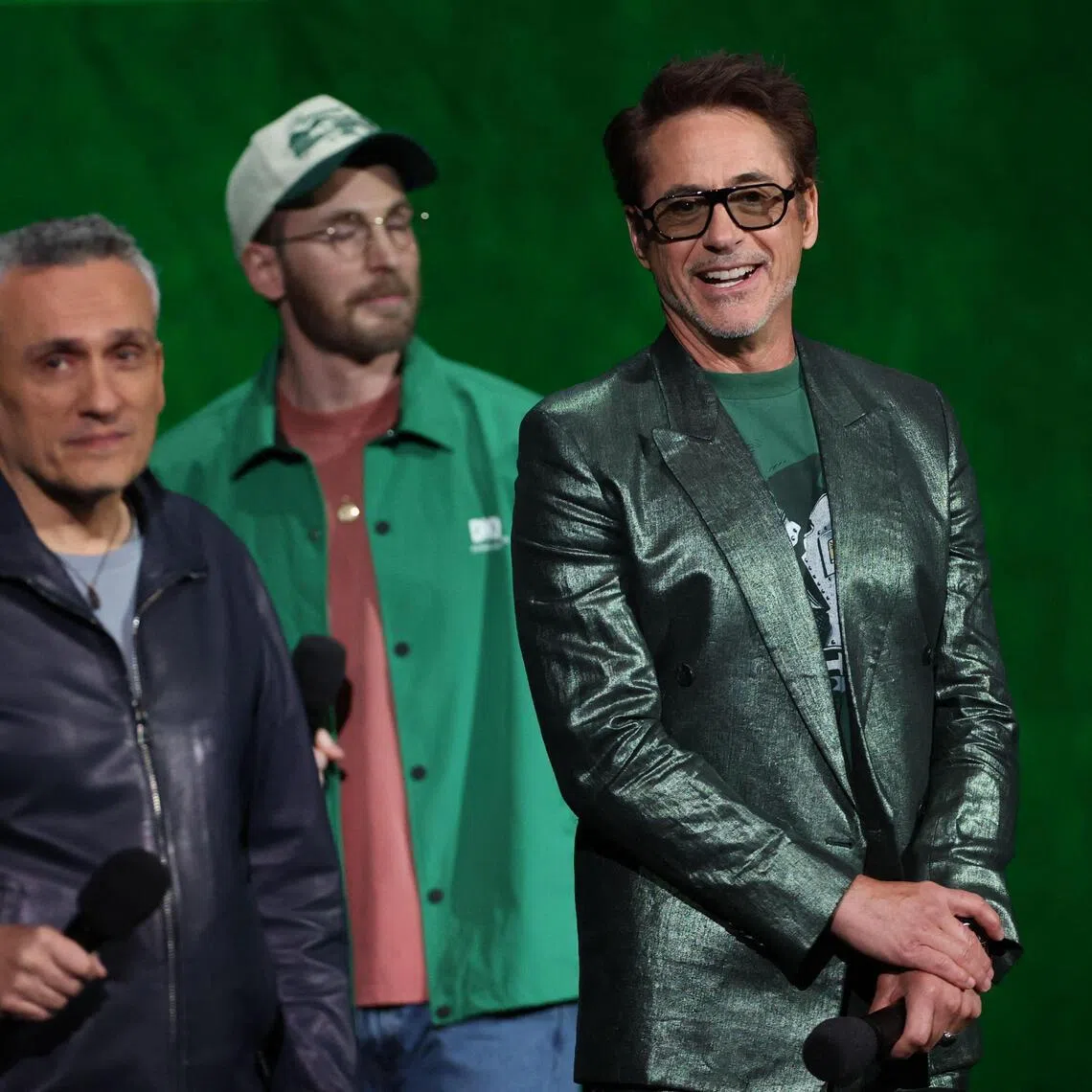 (From left) US filmmaker Joe Russo, actor Chris Evans and actor Robert Downey Jr promote Avengers: Doomsday at CinemaCon on April 16.