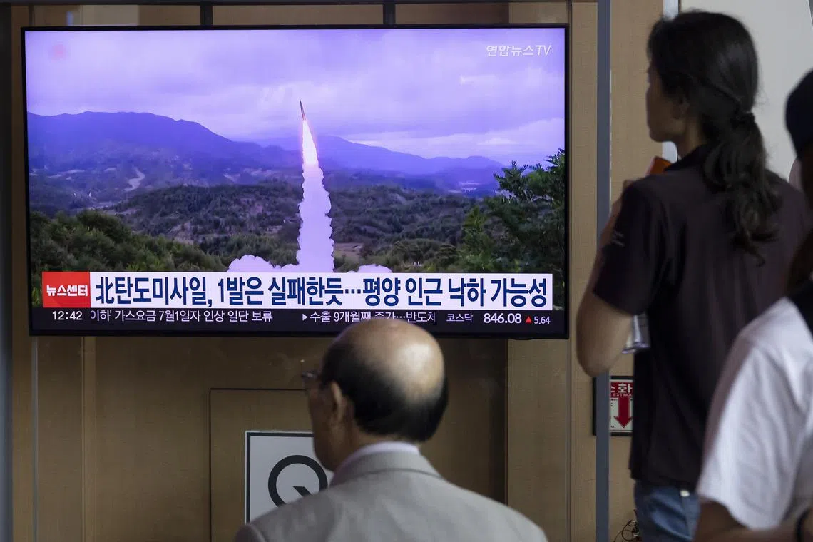People watching the news on a TV monitor at a station in Seoul, South Korea, on July 1. According to South Korea's Joint Chiefs of Staff, North Korea launched two ballistic missiles into the East Sea  that day. 