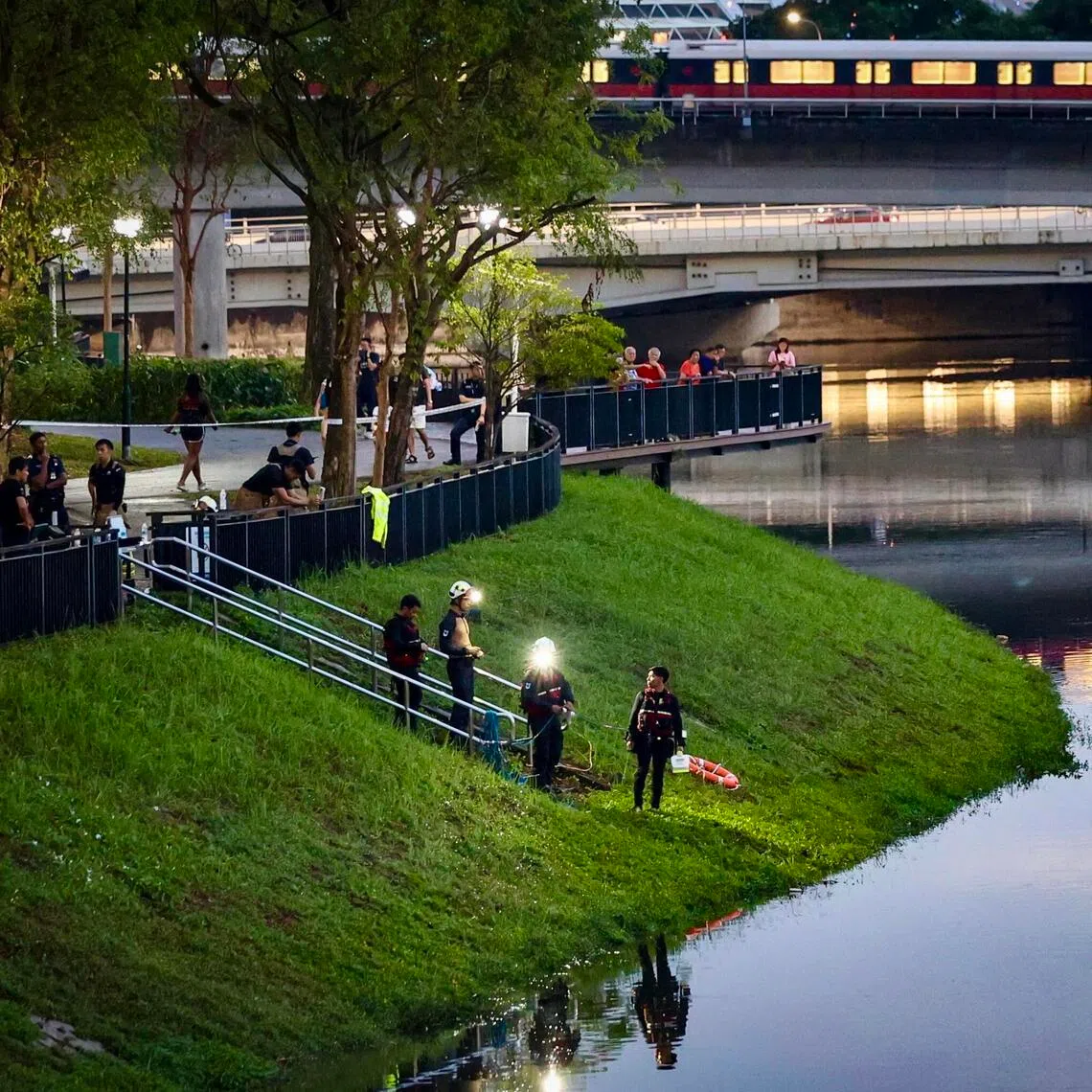 Search operations are suspended till first light on Feb 26 because of low visibility, SCDF said.