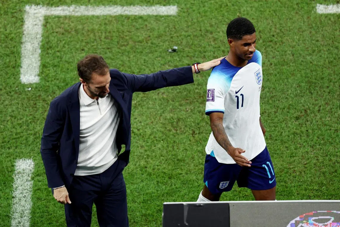 England manager Gareth Southgate with Marcus Rashford at the 2022 World Cup in Qatar.
