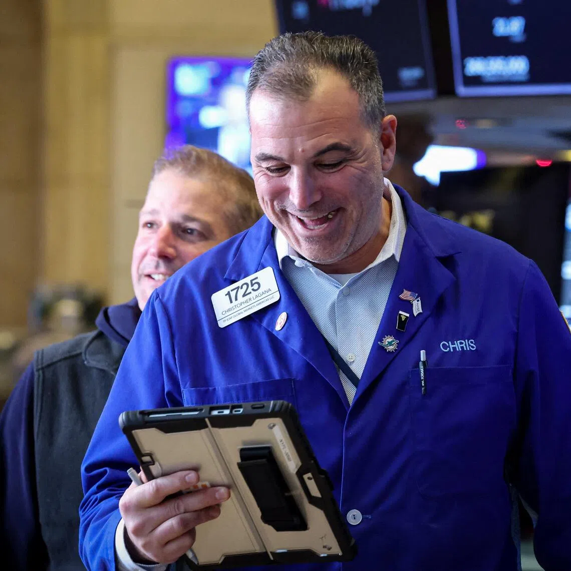 Traders work on the floor at the New York Stock Exchange (NYSE) in New York City, U.S., November 26, 2025.  REUTERS/Brendan McDermid 