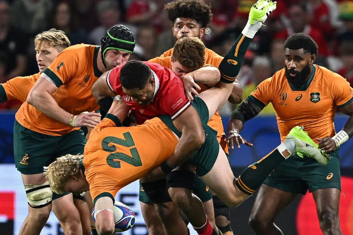 The Wallabies during their Rugby World Cup Pool C match against Wales at the OL Stadium in France.