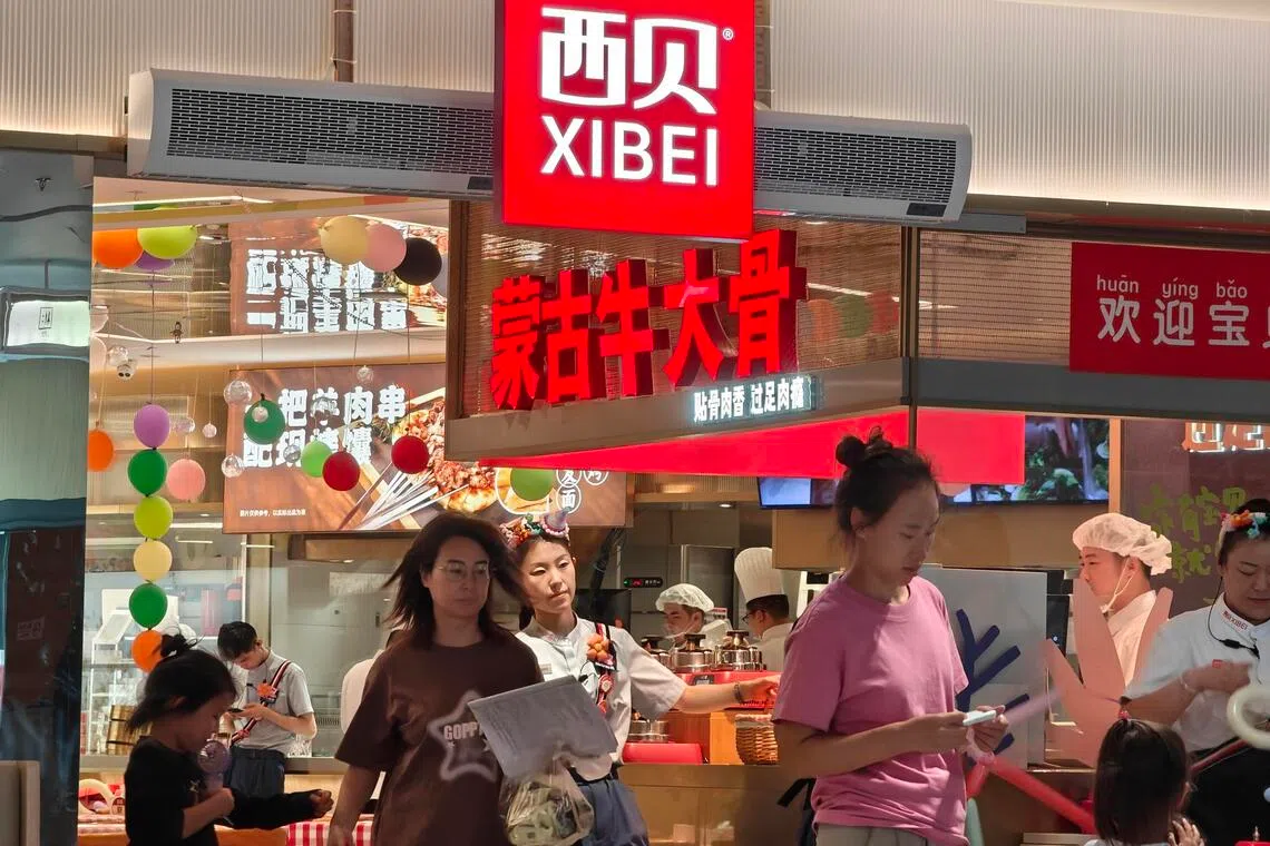 BEIJING, CHINA - SEPTEMBER 14: Exterior view of Xibei restaurant on September 14, 2025 in Beijing, China. The dispute between internet celebrity Luo Yonghao and the well-known Chinese restaurant chain Xibei has sparked heated discussions across China's internet over the transparency and definition of pre-made dishes. 
(Photo by Su Weizhong/VCG via Getty Images)