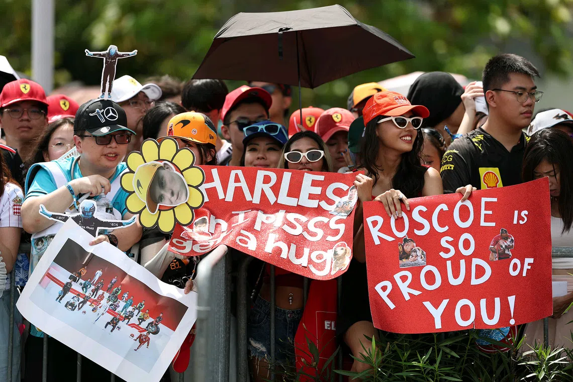 Fans waiting for the arrival of the drivers at the paddock entrance ahead of the final practice session of the 2025 Formula One Singapore Airlines Singapore Grand Prix at the Marina Bay Street Circuit on Oct 4, 2025. 
