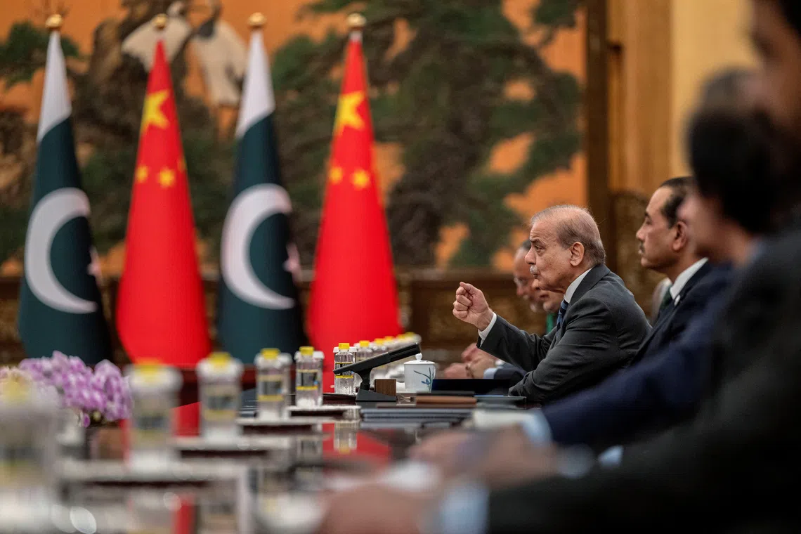 Pakistani Prime Minister Shehbaz Sharif  speaking at a meeting with Chinese President Xi Jinping in Beijing on Sept 2. 