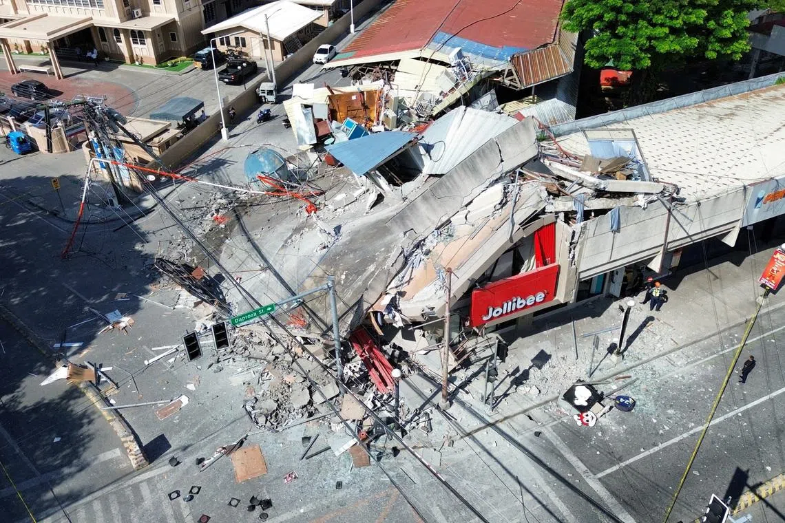 A drone view shows a collapsed building after a magnitude 7.8 quake in General Santos, Mindanao Island, Philippines, June 8, 2026. GenSan DEV/Handout via REUTERS    THIS IMAGE HAS BEEN SUPPLIED BY A THIRD PARTY. NO RESALES. NO ARCHIVES. MANDATORY CREDIT     TPX IMAGES OF THE DAY