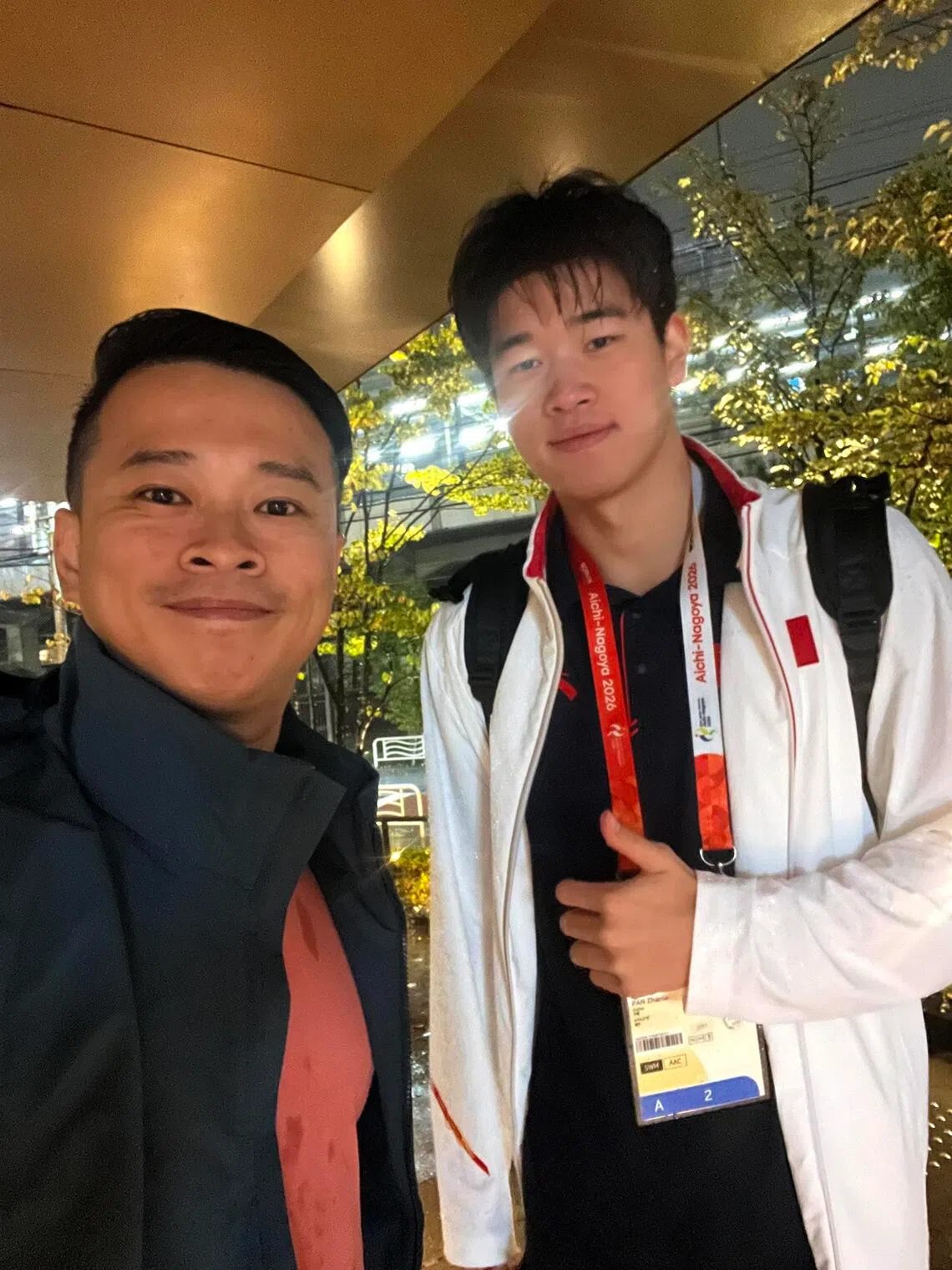China’s Asian Games men’s 100m freestyle champion and world-record holder Pan Zhanle also made the 15-minute trek in the rain from the Tokyo Aquatics Centre back to his team hotel.