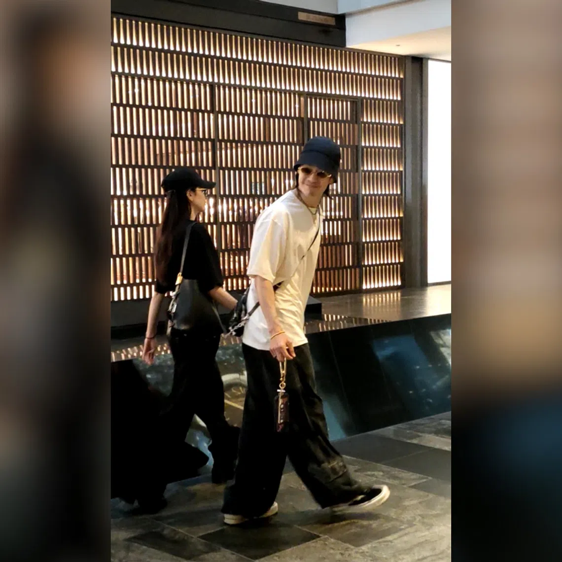 Van Ness Wu seen with a woman believed to be his wife Emi Aramaki at Marina Bay Sands on Aug 13.