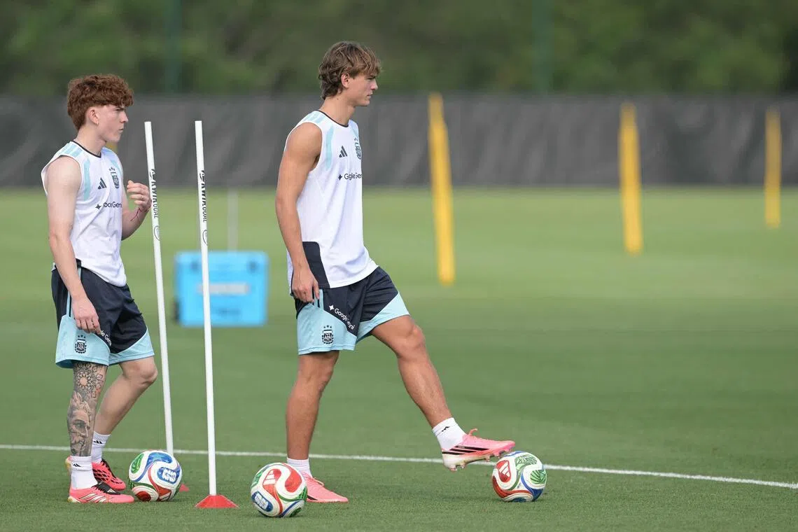 Argentina’s midfielder Valentin Barco (left) and forward Nico Paz at a training session at Sporting KC Training Centre in Kansas City on June 12.