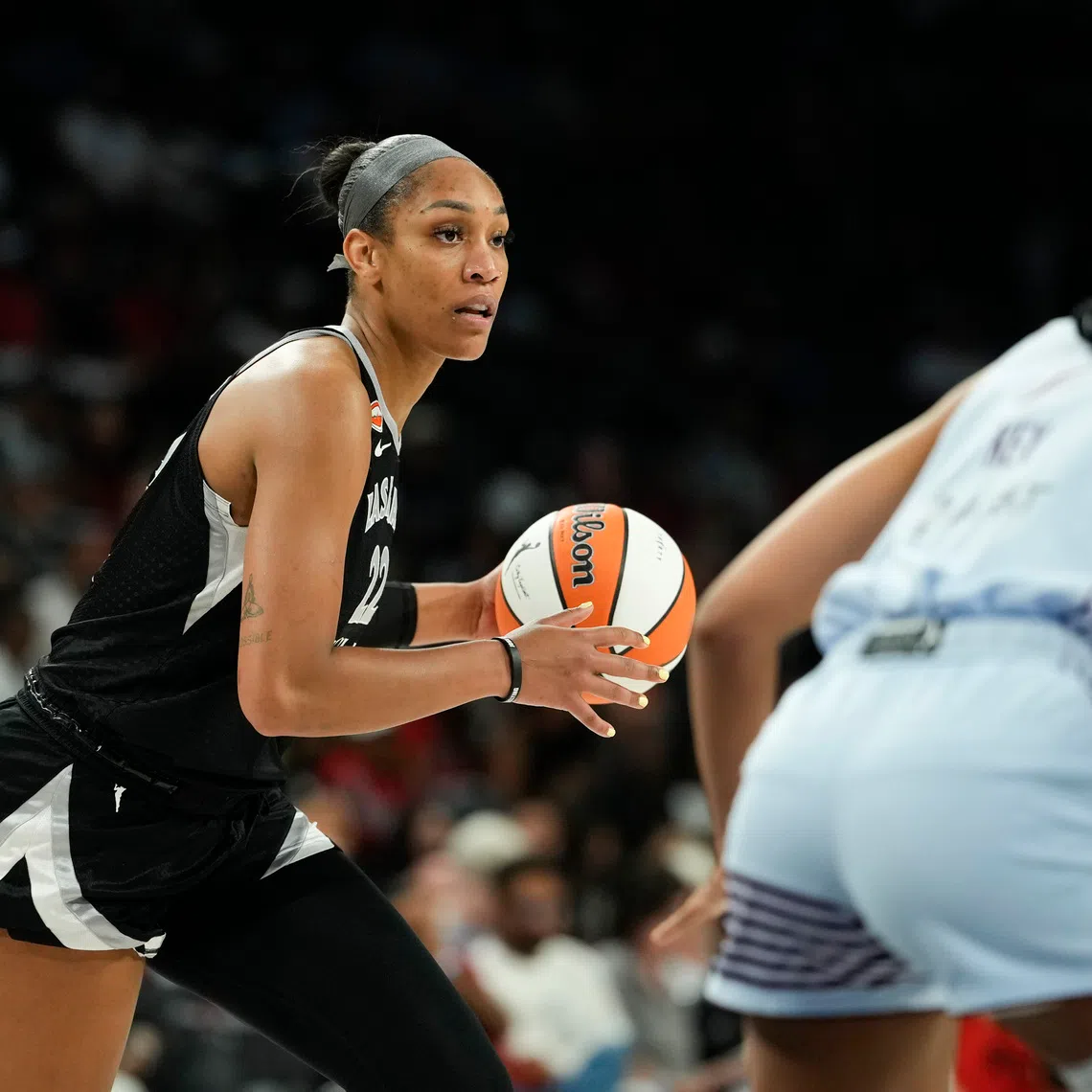 Aug 28, 2026; Las Vegas, Nevada, USA;  Las Vegas Aces center A'ja Wilson (22) controls the ball against the Toronto Tempo during the second quarter of a WNBA basketball game at Michelob Ultra Arena.  Mandatory Credit: Lucas Peltier-Imagn Images