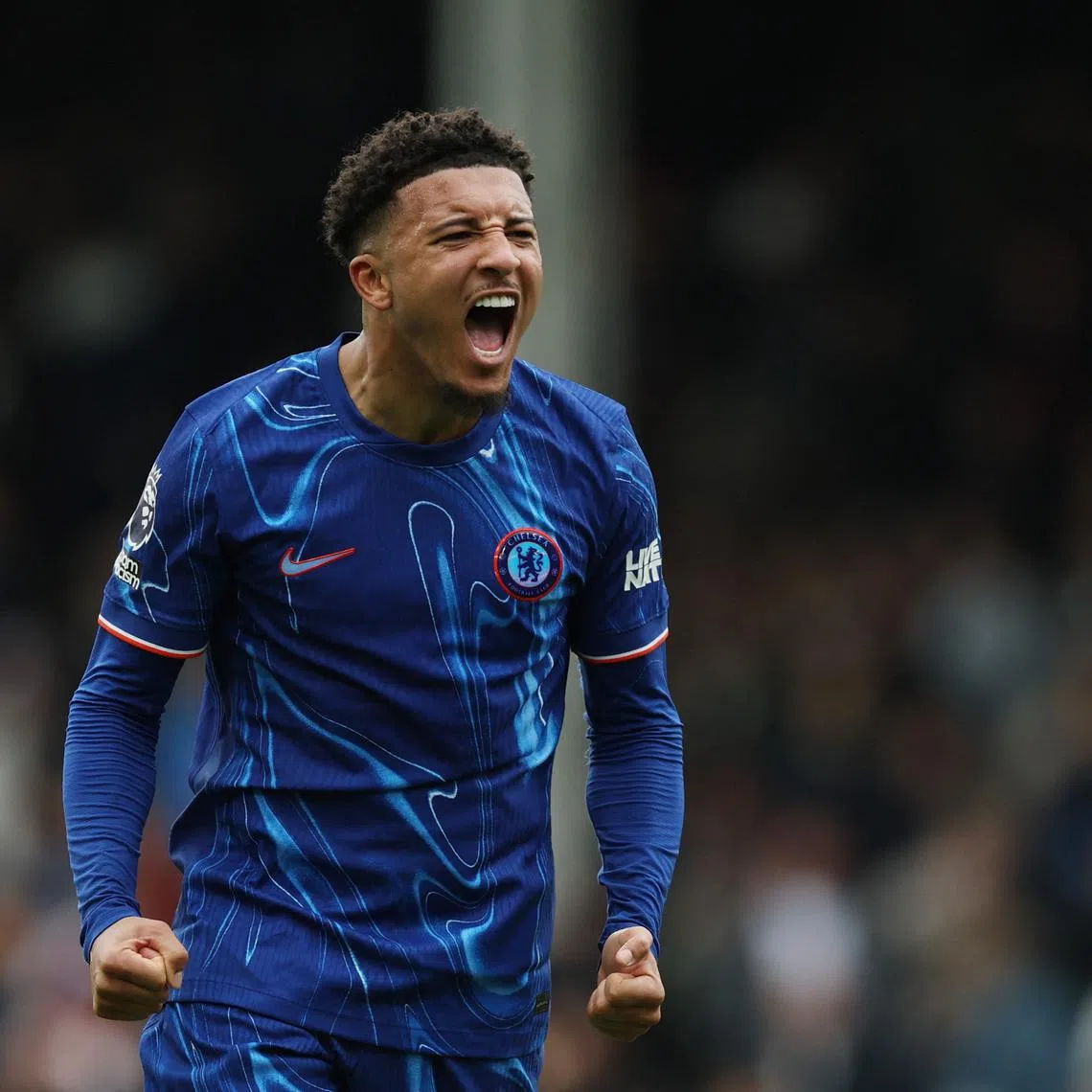 Soccer Football - Premier League - Fulham v Chelsea - Craven Cottage, London, Britain - April 20, 2025 Chelsea's Jadon Sancho celebrates after the match REUTERS/Hannah Mckay EDITORIAL USE ONLY. NO USE WITH UNAUTHORIZED AUDIO, VIDEO, DATA, FIXTURE LISTS, CLUB/LEAGUE LOGOS OR 'LIVE' SERVICES. ONLINE IN-MATCH USE LIMITED TO 120 IMAGES, NO VIDEO EMULATION. NO USE IN BETTING, GAMES OR SINGLE CLUB/LEAGUE/PLAYER PUBLICATIONS. PLEASE CONTACT YOUR ACCOUNT REPRESENTATIVE FOR FURTHER DETAILS..