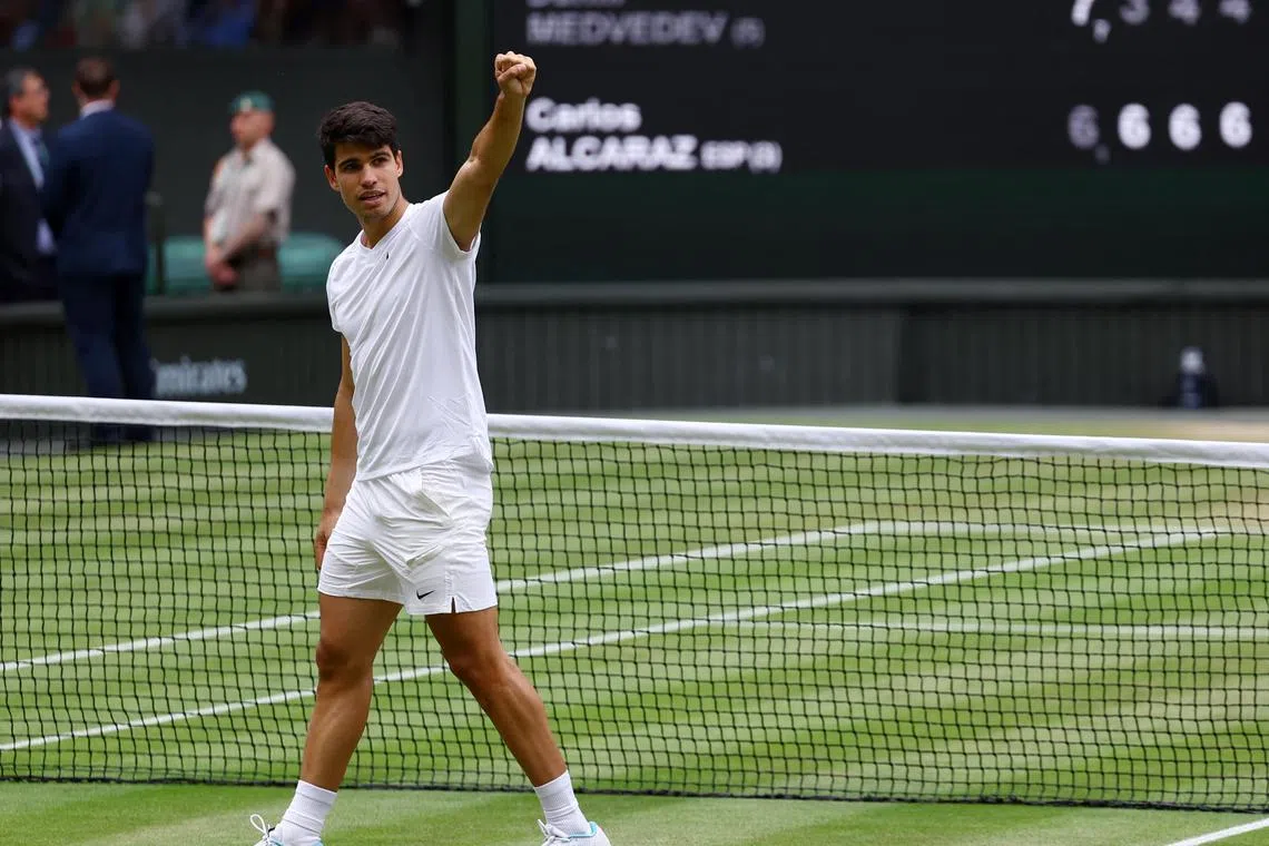 Tennis - Wimbledon - All England Lawn Tennis and Croquet Club, London, Britain - July 12, 2024  Spain's Carlos Alcaraz celebrates after winning his semi final match against Russia's Daniil Medvedev REUTERS/Paul Childs