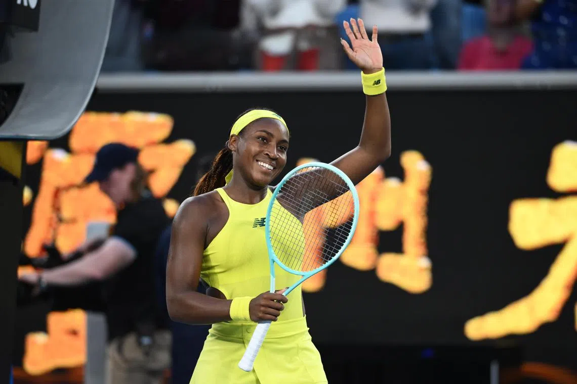 Coco Gauff waves to the crowd after winning against Leylah Fernandez at the Australian Open.