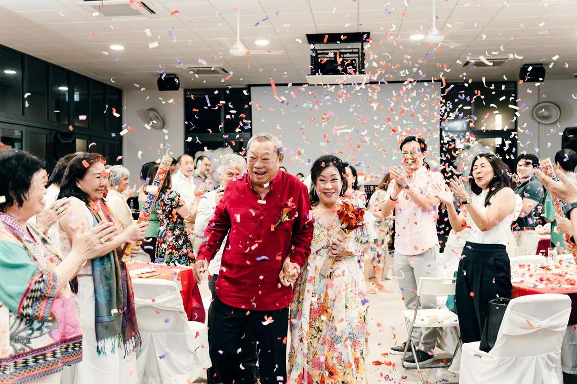 ctstamford22 - Stamford Tyres founder Wee Kok Wah and wife Dawn Wee  for above Business story. The colour one is their 53rd anniversary where they renewed their wedding vows, and the b/w one is their wedding dinner 53 years ago held in the company's Kallang factory. 

Credit Stamford Tyres.
