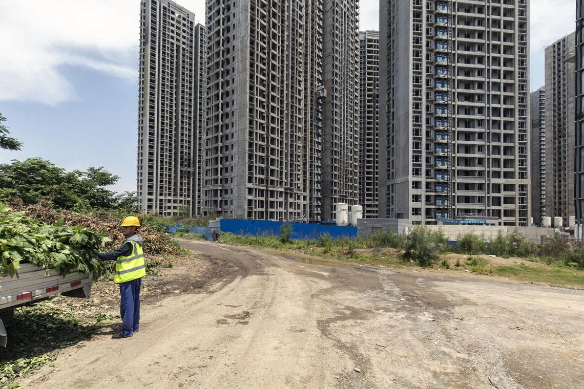 Residential buildings under construction in Zhengzhou in China's Henan province on June 7, 2023. 