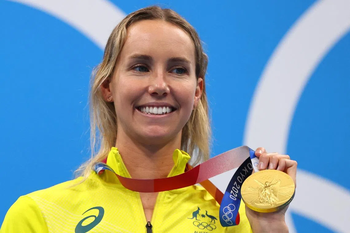FILE PHOTO: Tokyo 2020 Olympics - Swimming - Women's 100m Freestyle - Medal Ceremony - Tokyo Aquatics Centre - Tokyo, Japan - July 30, 2021. Emma McKeon of Australia poses on the podium with the gold medal REUTERS/Marko Djurica/File Photo