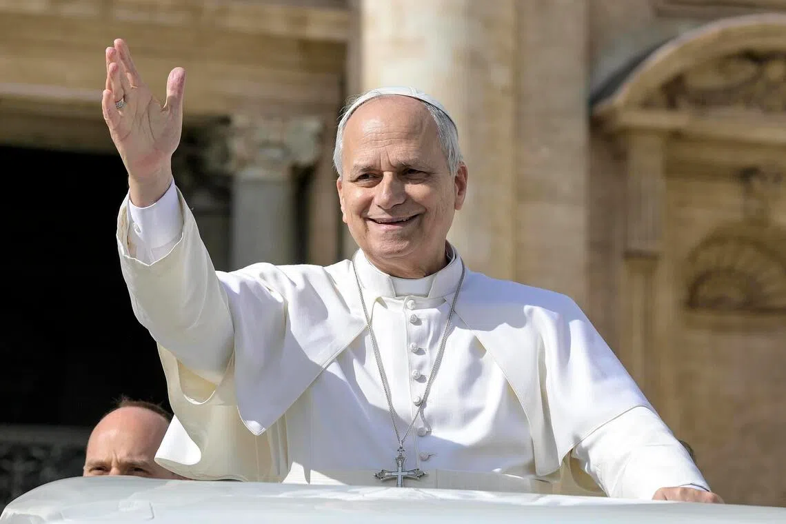 Pope Leo XIV waving to the faithful on Feb 18, during the weekly general audience in Saint Peter's Square, in the Vatican City.