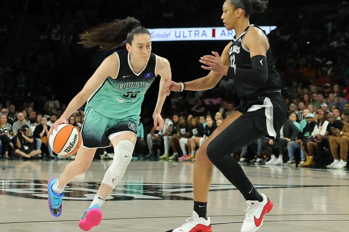 Breanna Stewart of the New York Liberty drives against A'ja Wilson of the Las Vegas Aces in the third quarter of Game 4 of the 2024 WNBA Play-offs semi-finals.