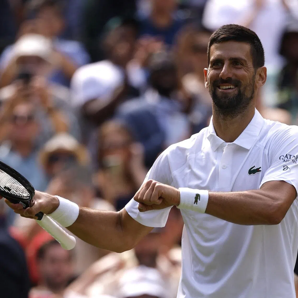 Tennis - Wimbledon - All England Lawn Tennis and Croquet Club, London, Britain - July 3, 2025 Serbia's Novak Djokovic celebrates winning his second round match against Britain's Daniel Evans REUTERS/Andrew Couldridge