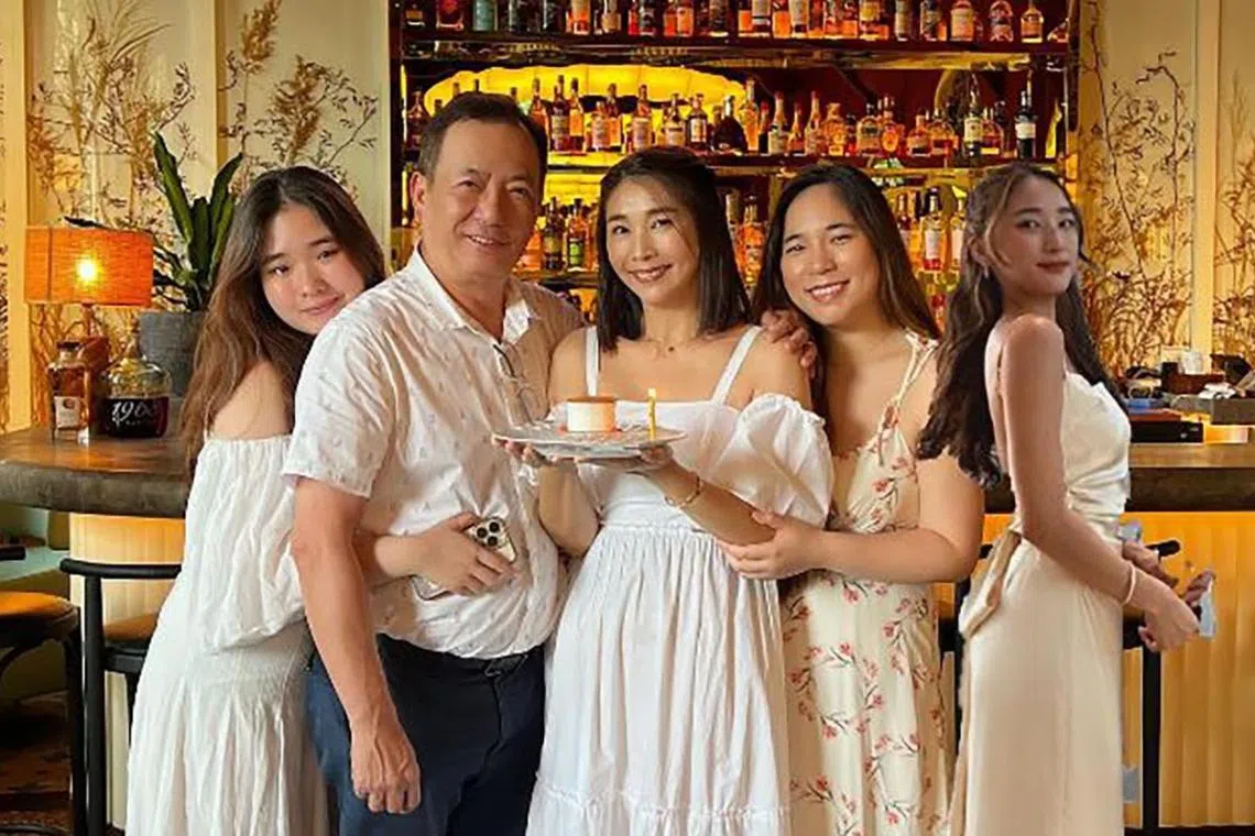 Actress Chen Xiuhuan (centre) with her (from left) youngest daughter Shavinne, husband Fred Tsai, eldest daughter Shanisse  and "photoshopped" Shalynn. 