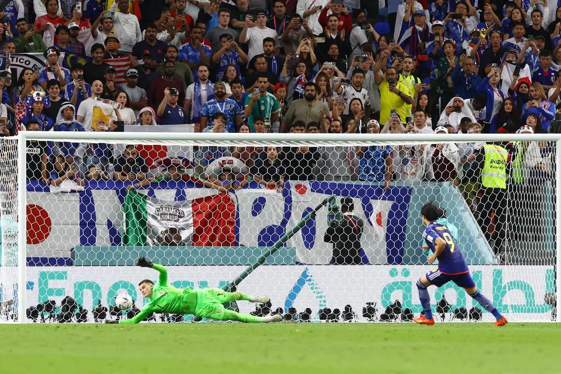Soccer Football - FIFA World Cup Qatar 2022 - Round of 16 - Japan v Croatia - Al Janoub Stadium, Al Wakrah, Qatar - December 5, 2022
Croatia's Dominik Livakovic saves a penalty missed by Japan's Kaoru Mitoma REUTERS/Matthew Childs