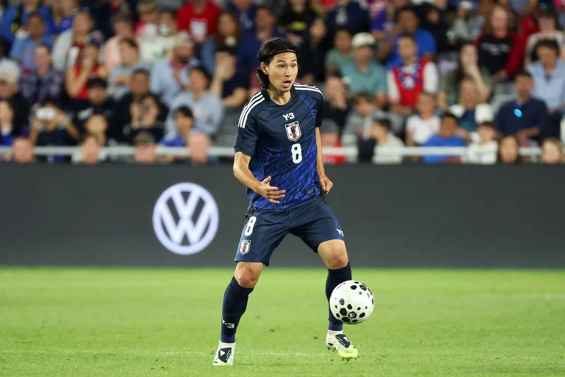 Sep 9, 2025; Columbus, Ohio, USA;  Japan midfielder Takumi Minamino (8) looks to pass the ball during the second half against the US Men's National Team at Lower.com Field. Mandatory Credit: Joseph Maiorana-Imagn Images
