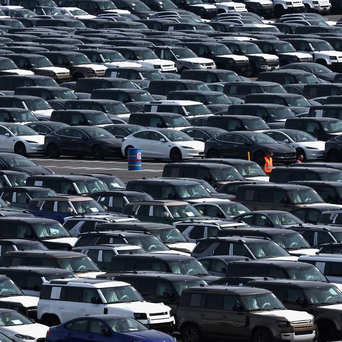 New cars, imported or waiting to be exported, are parked in the port of Zeebrugge, Belgium, July 18, 2025. REUTERS/Yves Herman/File Photo