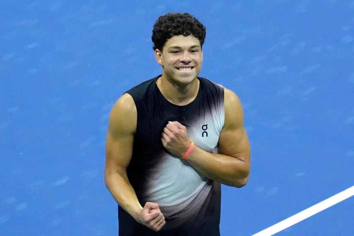 Ben Shelton celebrates winning his US Open semi-final match against Frances Tiafoe.