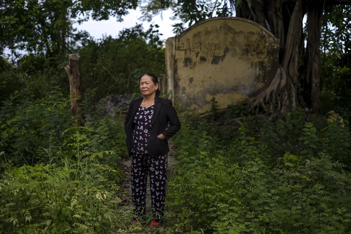 Ms Nguyen Thi Thanh, a survivor of the massacre in Phong Nhi and Phong Nhat, standing near where the Vietnam War massacre took place.
