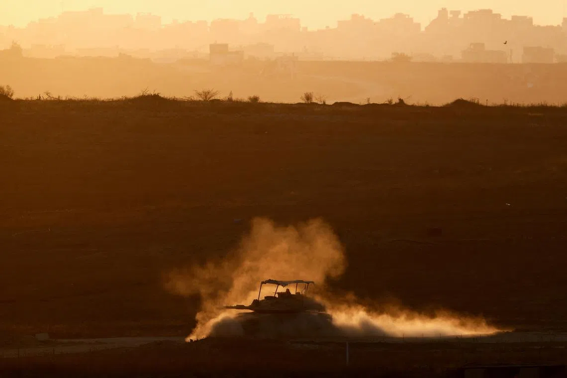 An Israeli tank manoeuvring in Gaza, as seen from Israel, on June 5, 2025. 