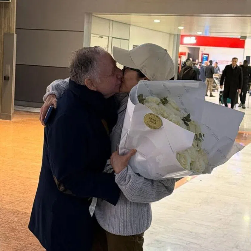 Michelle Yeoh said she had waited patiently at an airport in France to surprise her “love” with a bouquet of white roses on his 80th birthday.