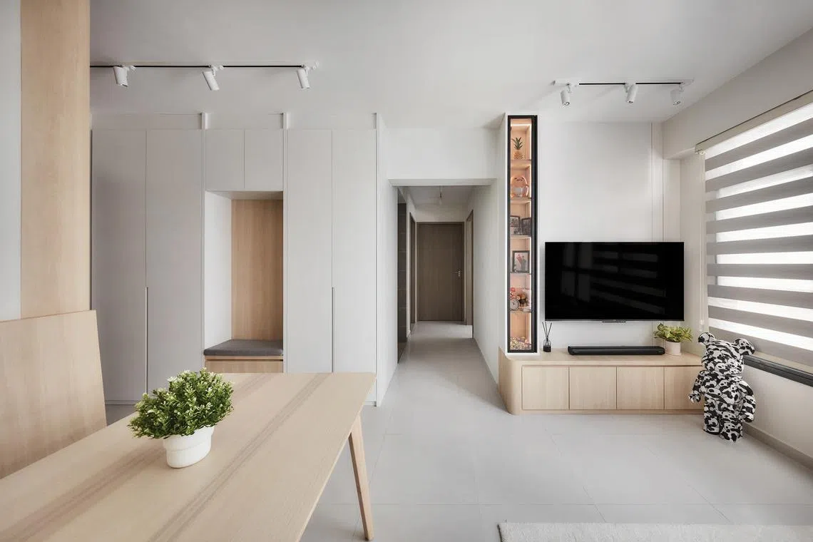 This compact, low-maintenance three-room HDB flat is home to a mother and son.