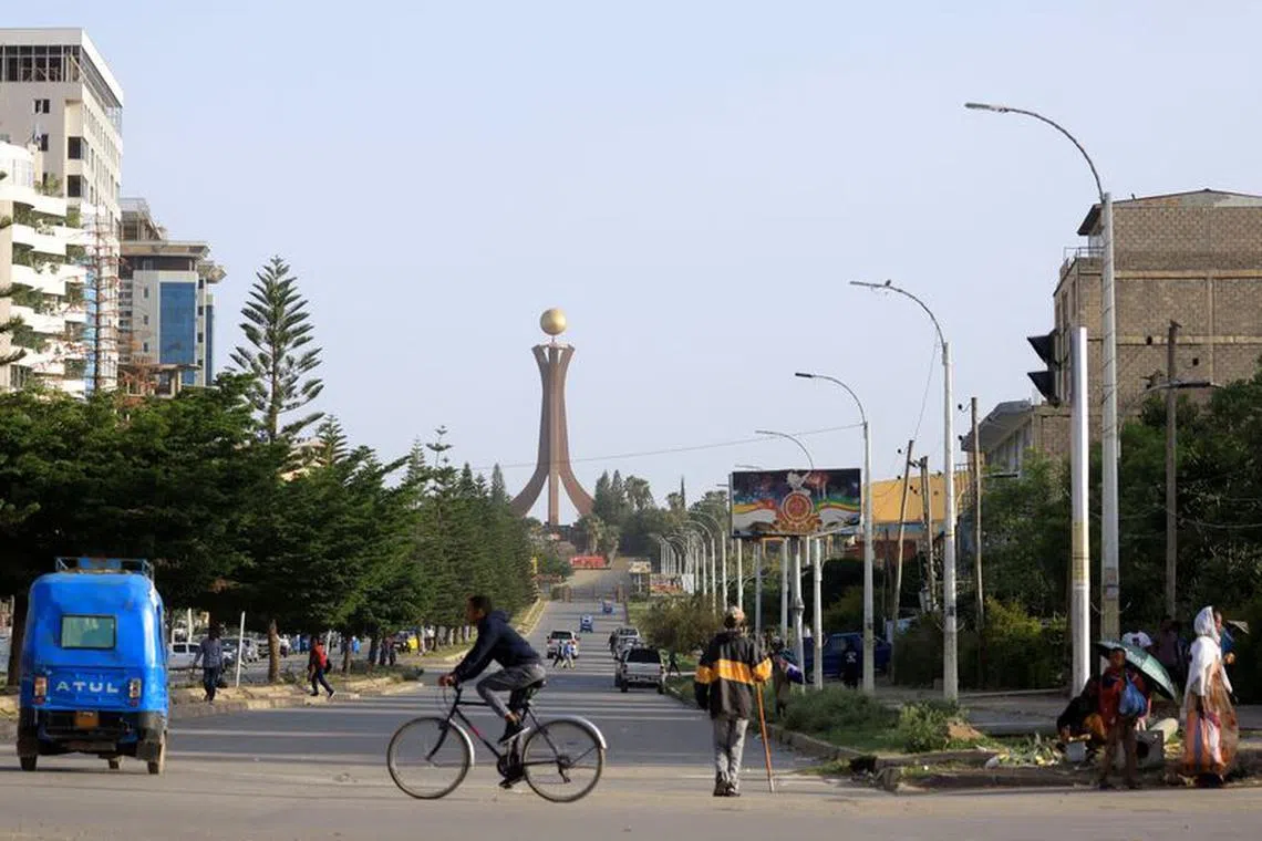 FILE PHOTO: A general view shows motorists and a biker near the Tigray Martyrs monument in Mekele, Tigray Region, Ethiopia, June 22, 2023. REUTERS/Tiksa Negeri