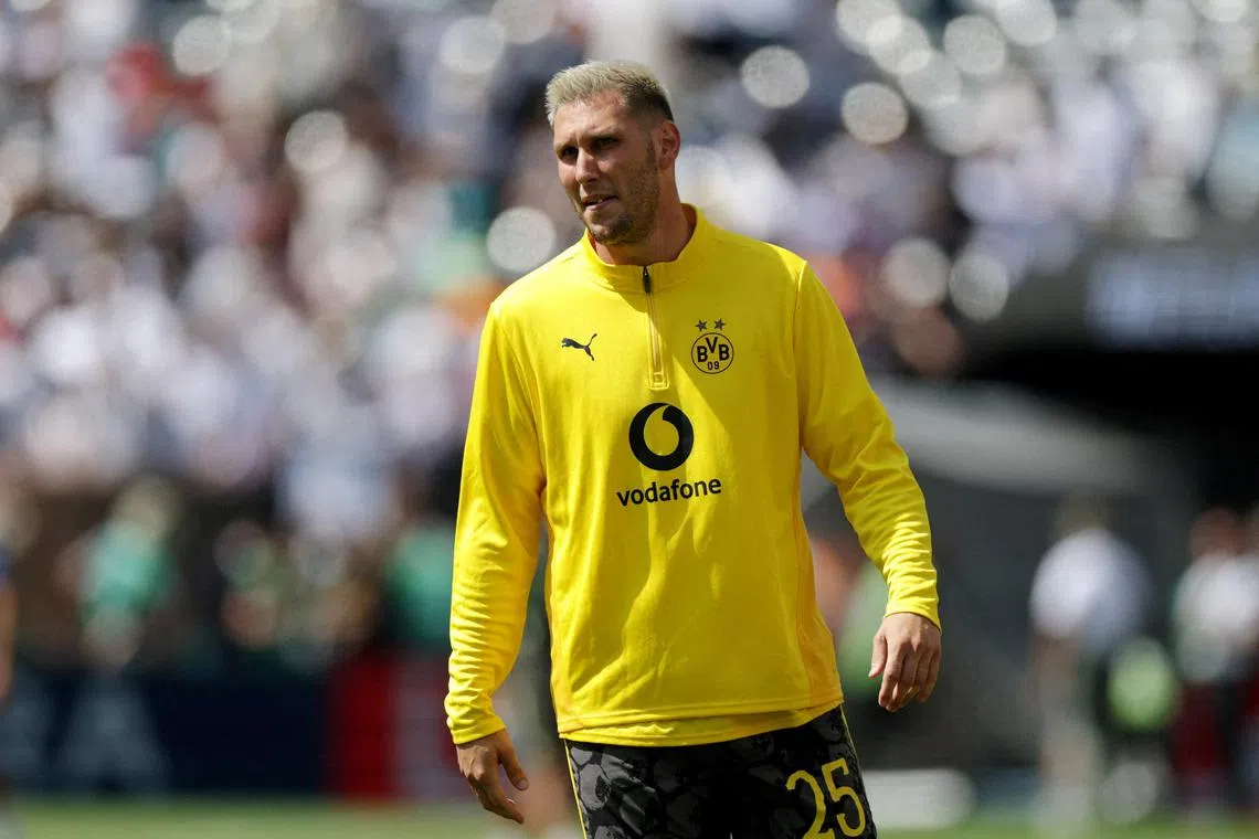 FILE PHOTO: Soccer Football - FIFA Club World Cup - Quarter Final - Real Madrid v Borussia Dortmund - MetLife Stadium, East Rutherford, New Jersey, U.S. - July 5, 2025 Borussia Dortmund's Niklas Sule during the warm up before the match REUTERS/Jeenah Moon/File Photo