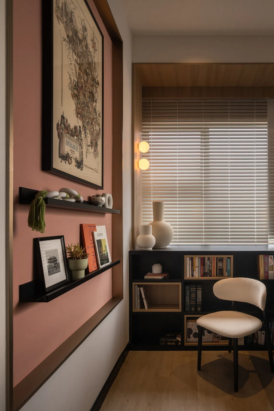 High bay windows give the couple space for their large book collection.