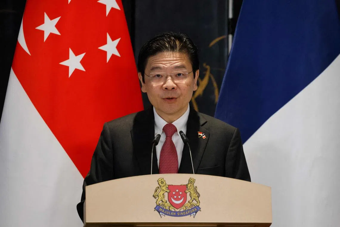 Prime Minister Lawrence Wong during a press briefing with France's President Emmanuel Macron on May 30.