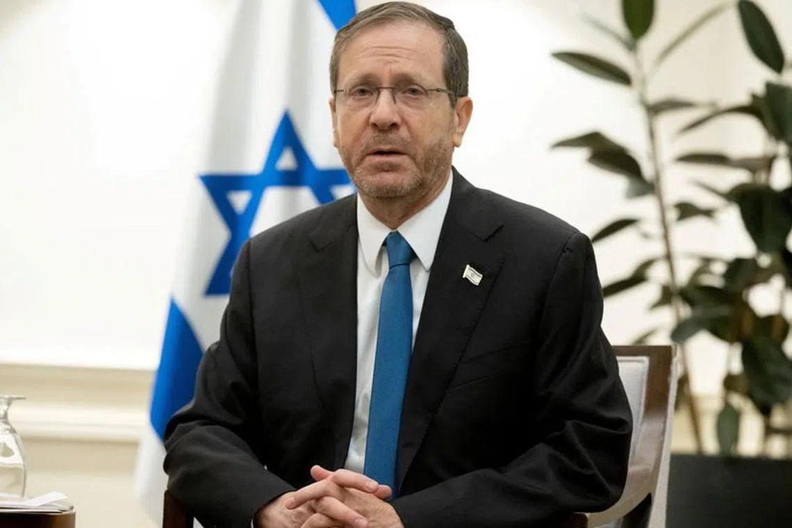Israel's President Isaac Herzog attends a meeting with the U.S. Secretary of State (not pictured), in Tel Aviv, Israel on November 30, 2023, following the announcement of an extension of the truce between Israel and Hamas just before it was due to expire. SAUL LOEB/Pool via REUTERS/File Photo