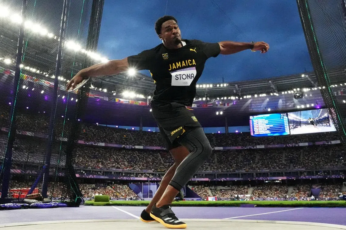 FILE PHOTO: Paris 2024 Olympics - Athletics - Men's Discus Throw Final - Stade de France, Saint-Denis, France - August 07, 2024. Roje Stona of Jamaica in action REUTERS/Pawel Kopczynski/File Photo