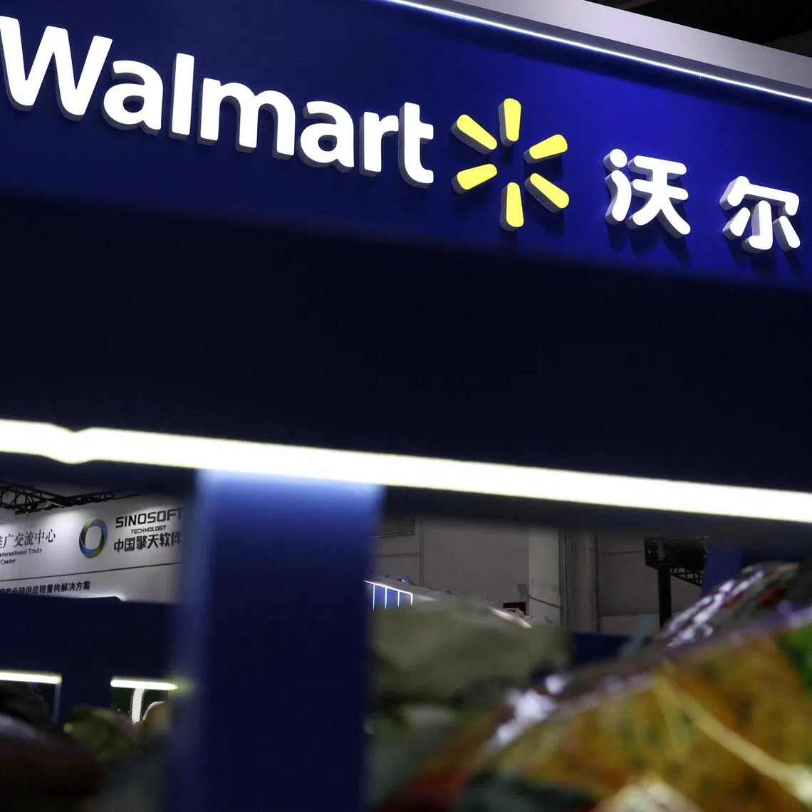 Once dominated by sprawling hypermarkets packed with name-brand goods, chains from Walmart and Wumart are streamlining and pushing their own brands.
