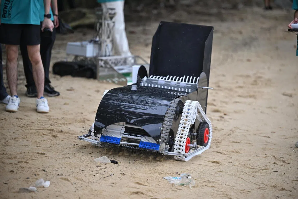 The Sand-E robot is a fully remote-controlled device designed to maintain beach cleanliness by removing surface-level pollutants near the shoreline.