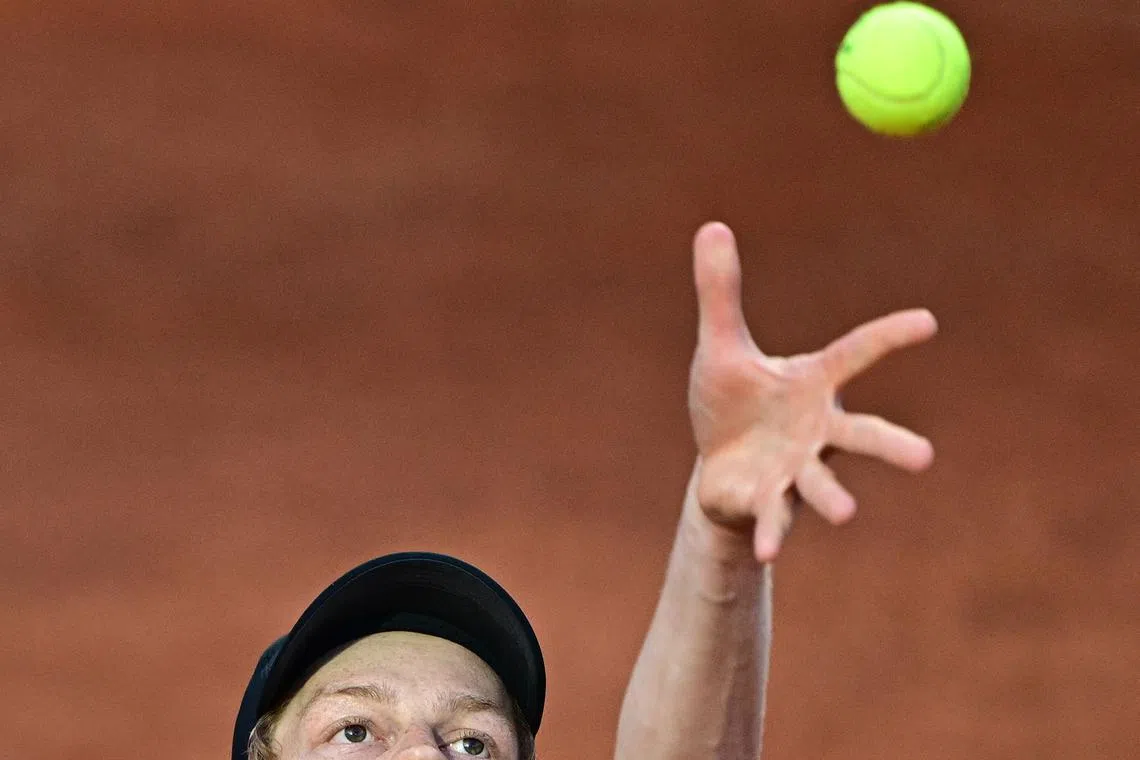 Italy's Jannik Sinner serving during a training session at Foro Italico sports complex, ahead of the Italian Open tennis tournament, in Rome, on May 5, 2025. 