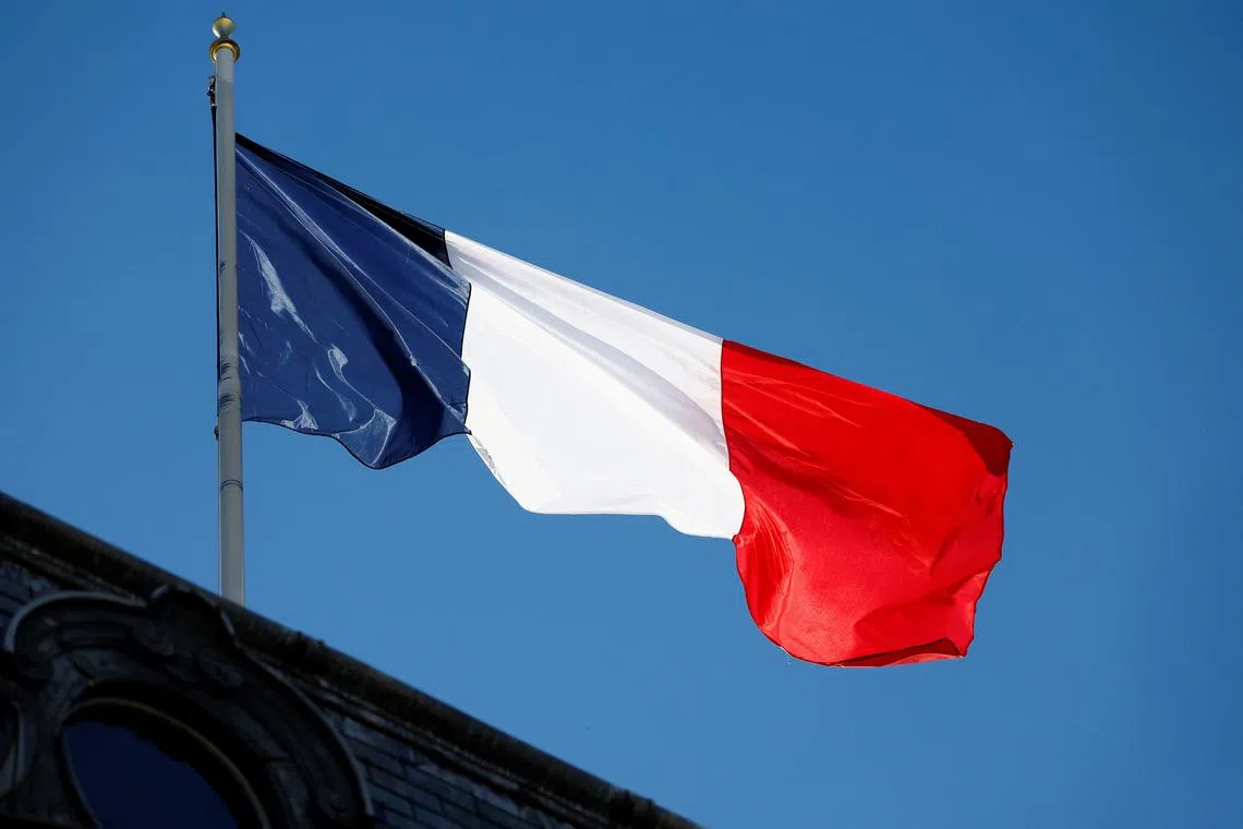 A French national flag flies above the Elysee Palace in Paris, France, October 23, 2024. REUTERS/Stephanie Lecocq