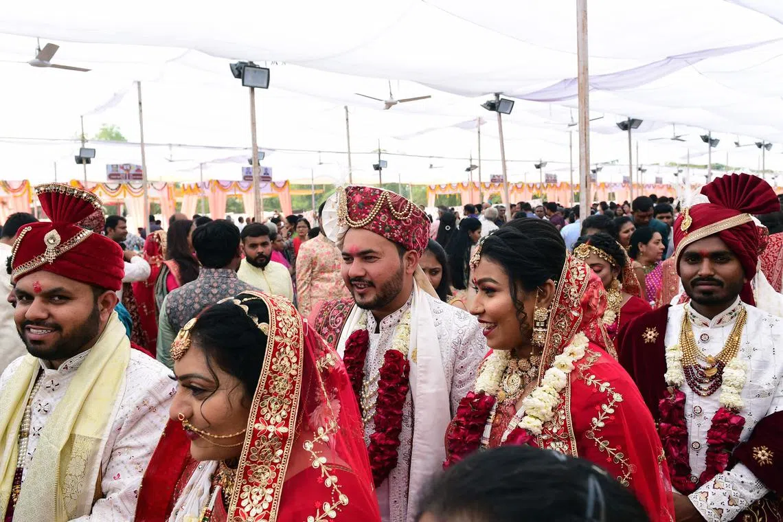 In India, marriage has always been treated as a union not just between a man and a woman but also their families, putting pressure on couples to stick to each other despite differences..(Photo by SAM PANTHAKY / AFP)