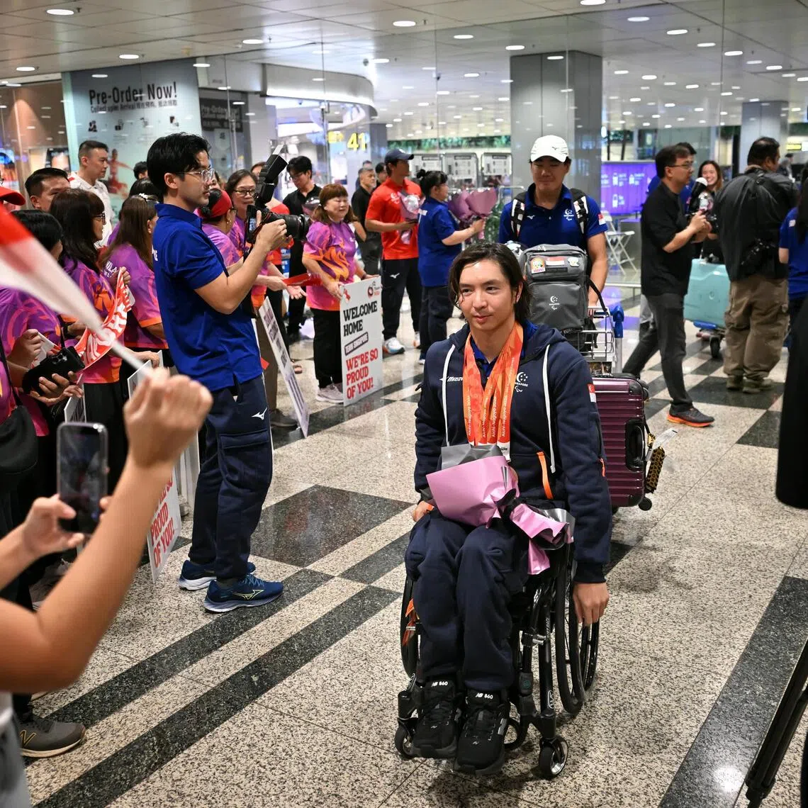 Team Singapore returning from Aichi-Nagoya 2026 Asian Para Games, at Changi Airport Terminal 3, on Oct 26, 2026. 
David Neo, Minister for Culture, Community and Youth and Second Minister for Education, was with the fans and relatives to welcome Team Singapore.