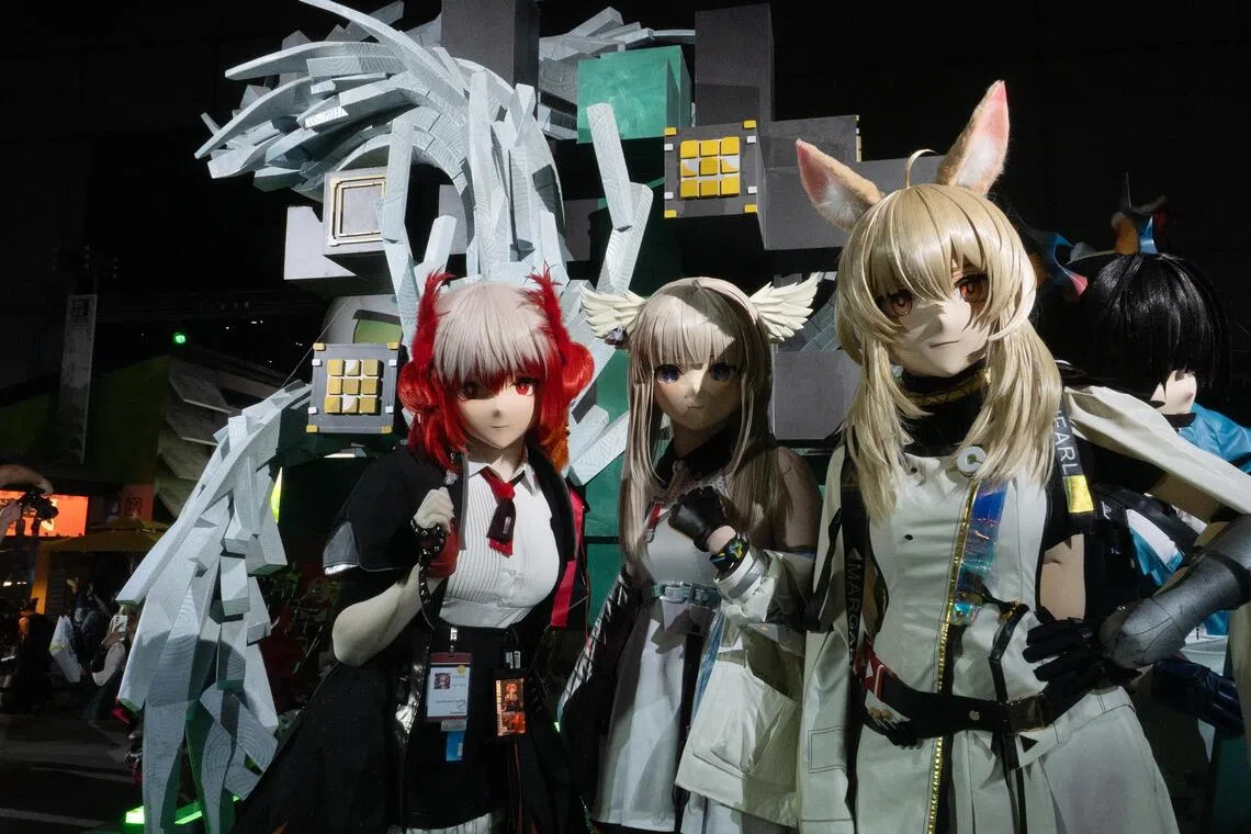 Attendee Kigurumi cosplayers at the Hypergryph Carnival at the National Exhibition and Convention Center in Shanghai.