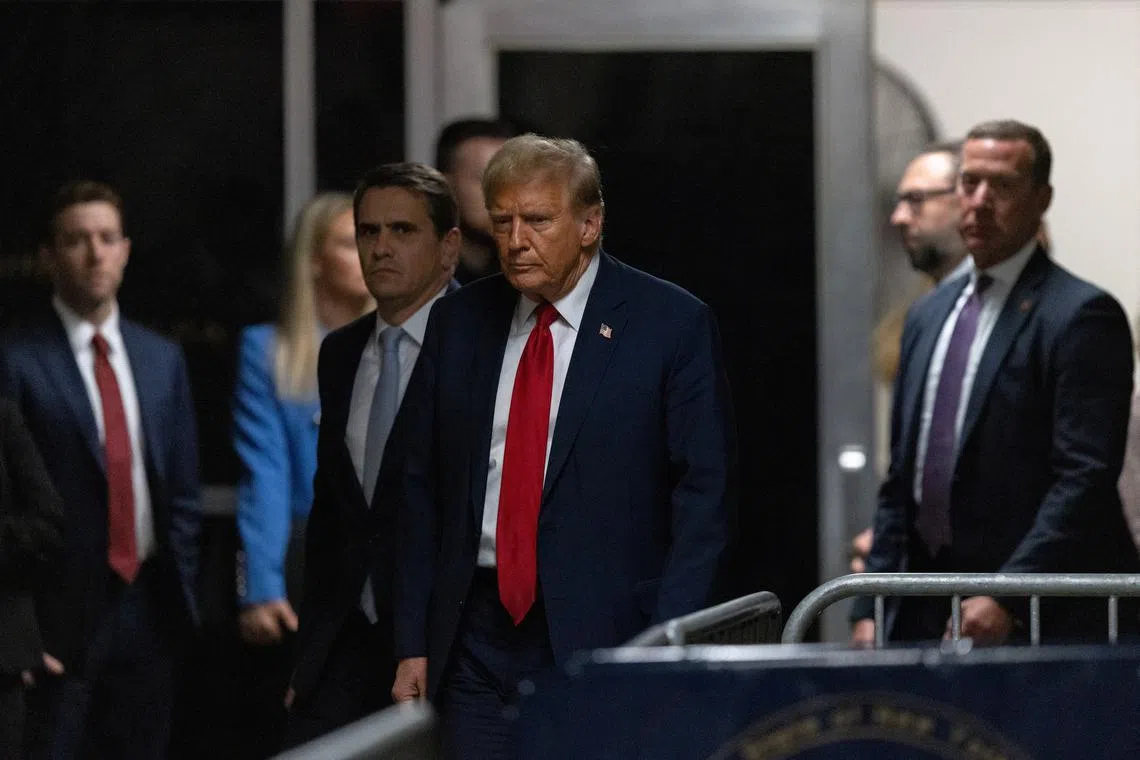 FILE PHOTO: Former US President Donald Trump exits at Manhattan criminal court in New York, US, on Thursday, April 25, 2024.  JEENAH MOON/Pool via REUTERS/File Photo