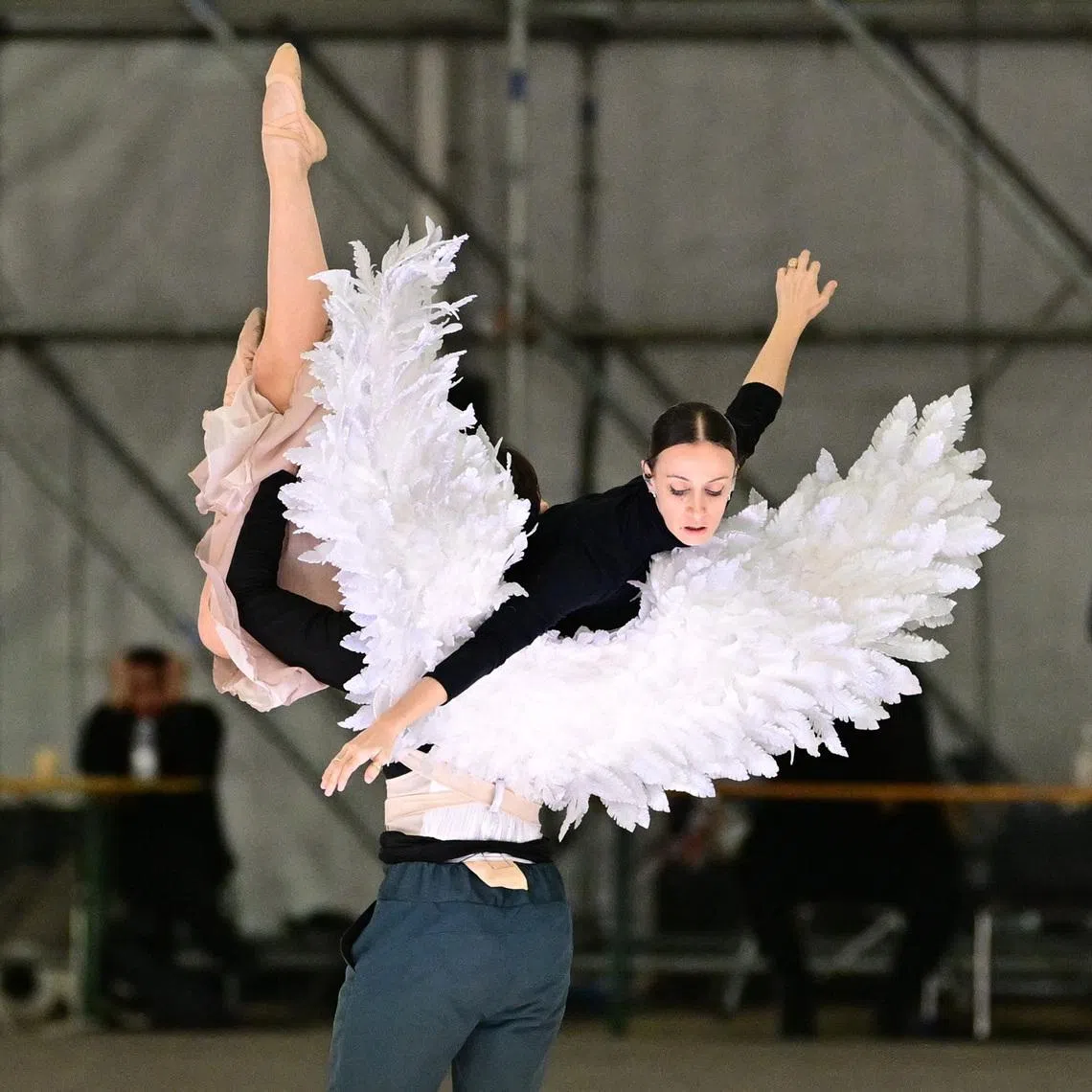Milano Cortina 2026 Winter Olympics - Opening ceremony rehearsals - Milan, Italy - January 28, 2026 Volunteer dancers rehearse during preparations for the opening ceremony inside a temporary structure next to San Siro stadium ahead of the Milano Cortina 2026 Winter Olympics. REUTERS/Daniele Mascolo