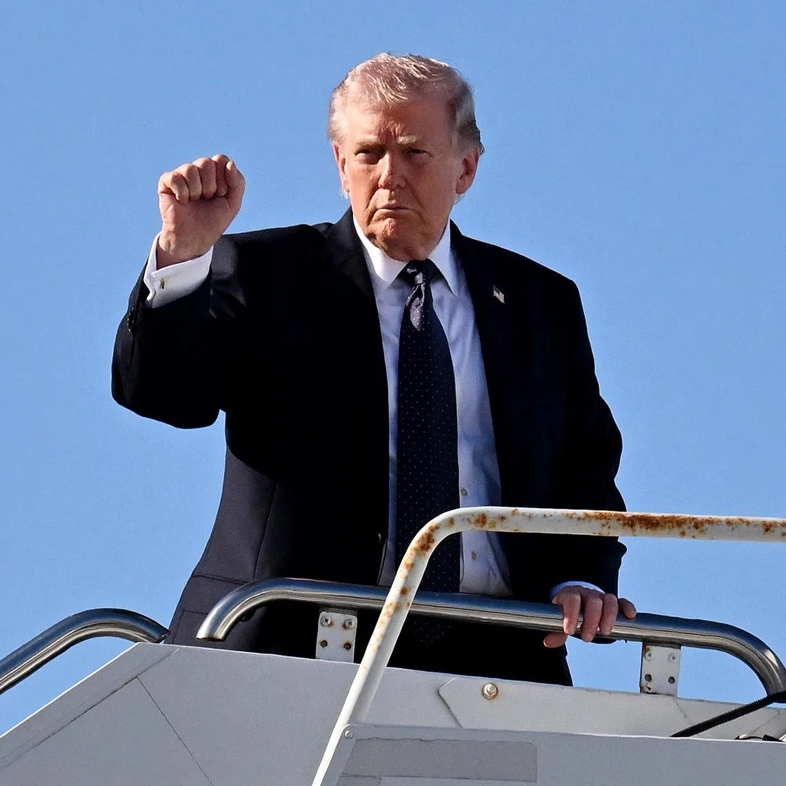 US President Donald Trump boards Air Force One at Palm Beach International Airport in Florida on March 1.