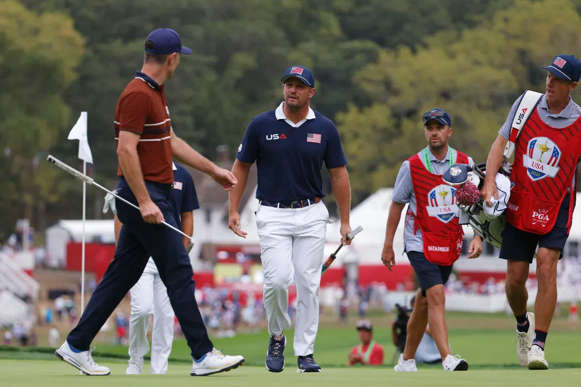 Golf - The 2025 Ryder Cup - Bethpage Black Golf Course, Farmingdale, New York, United States - September 27, 2025 Team Europe's Justin Rose and Team USA's Bryson DeChambeau argue on the 15th green during the four-balls IMAGN IMAGES via Reuters/Peter Casey